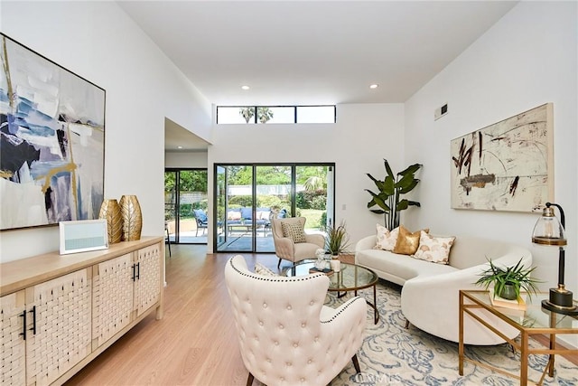 9539 Gladbeck Ave, Northridge, CA 91324 - living area with light wood-style floors and recessed lighting