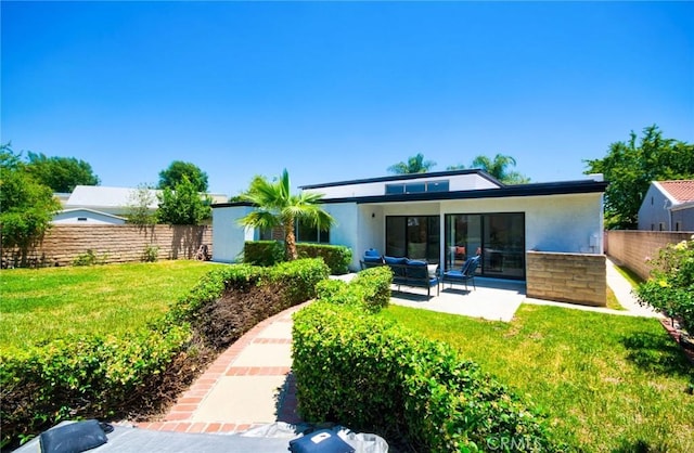 9539 Gladbeck Ave, Northridge, CA 91324 - back of house featuring stucco siding, a patio, and an outdoor living space