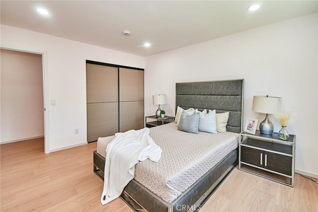 9539 Gladbeck Ave, Northridge, CA 91324 - bedroom with wood finished floors, a closet, recessed lighting, and baseboards