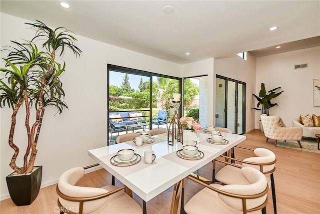9539 Gladbeck Ave, Northridge, CA 91324 - dining area with recessed lighting and light wood-style floors
