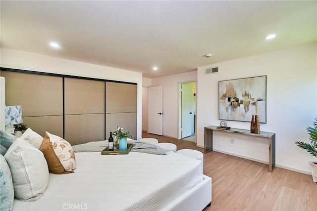 9539 Gladbeck Ave, Northridge, CA 91324 - bedroom featuring wood finished floors and recessed lighting