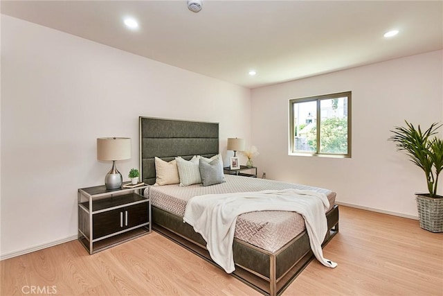 9539 Gladbeck Ave, Northridge, CA 91324 - bedroom with light wood-type flooring, recessed lighting, and baseboards