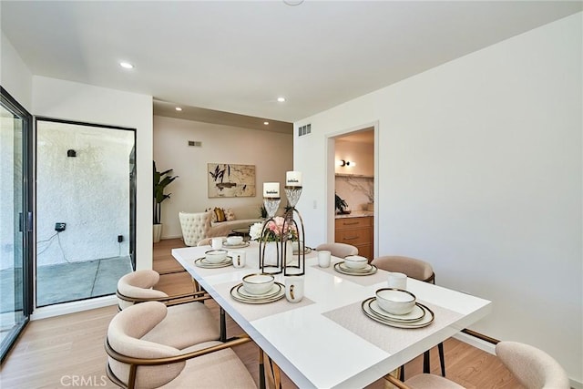 9539 Gladbeck Ave, Northridge, CA 91324 - dining room with light wood finished floors and recessed lighting