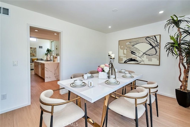 9539 Gladbeck Ave, Northridge, CA 91324 - dining room featuring light wood-style flooring, recessed lighting, and baseboards