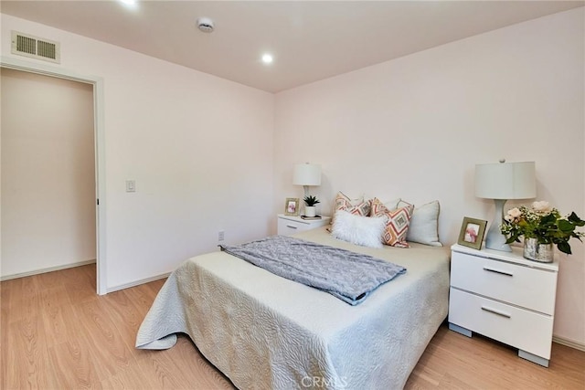 9539 Gladbeck Ave, Northridge, CA 91324 - bedroom with light wood-style flooring, recessed lighting, and baseboards