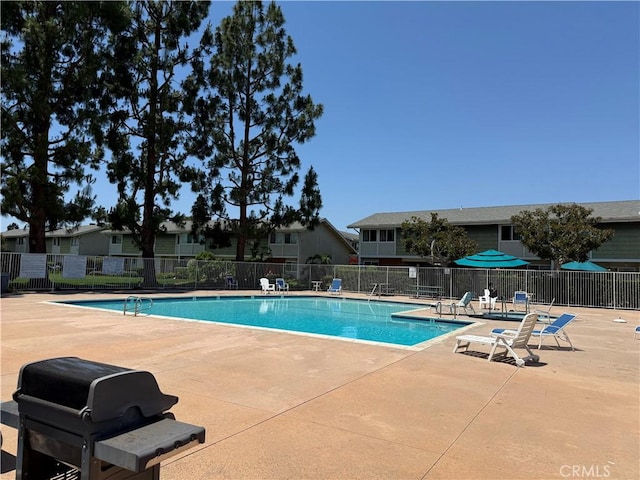 1404 N Tustin Ave Unit H1, Santa Ana, CA 92705 - community pool featuring a patio