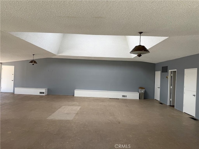 1404 N Tustin Ave Unit H1, Santa Ana, CA 92705 - additional living space with lofted ceiling and a textured ceiling