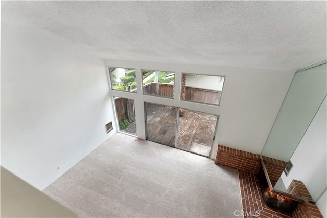 1404 N Tustin Ave Unit H1, Santa Ana, CA 92705 - carpeted empty room featuring a textured ceiling