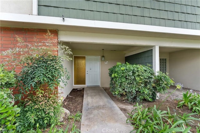 1404 N Tustin Ave Unit H1, Santa Ana, CA 92705 - entrance to property featuring stucco siding