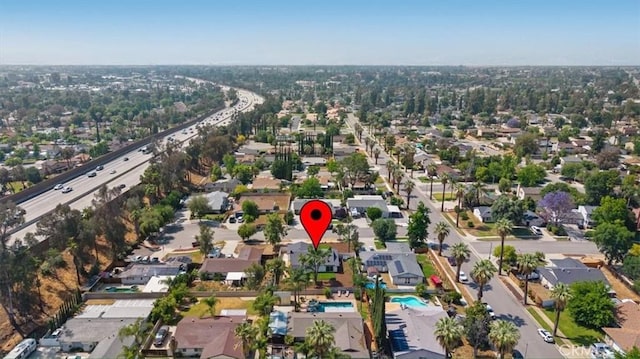 1208 Del Haven Ct, Redlands, CA 92374 - aerial overview of property's location featuring nearby suburban area and a pool area