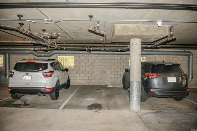 3078 Broadway Unit 107, San Diego, CA 92102 - parking deck featuring concrete block wall