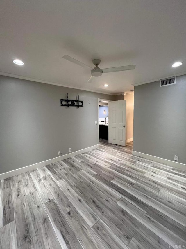 3078 Broadway Unit 107, San Diego, CA 92102 - unfurnished room featuring recessed lighting, light wood-type flooring, ceiling fan, and baseboards