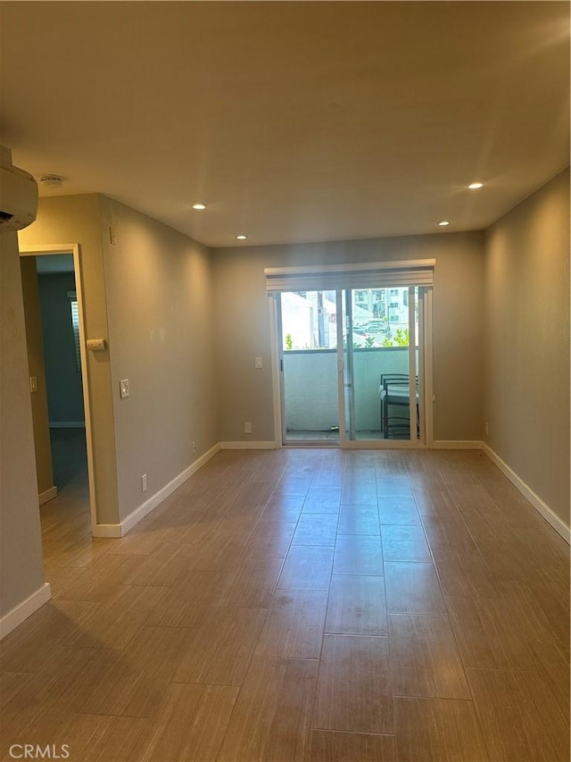 6330 Genesee Ave Unit 103, San Diego, CA 92122 - empty room with recessed lighting and wood finished floors