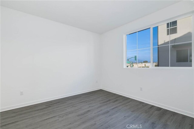 667 Limoncello Ln, Covina, CA 91723 - empty room with dark wood finished floors and baseboards