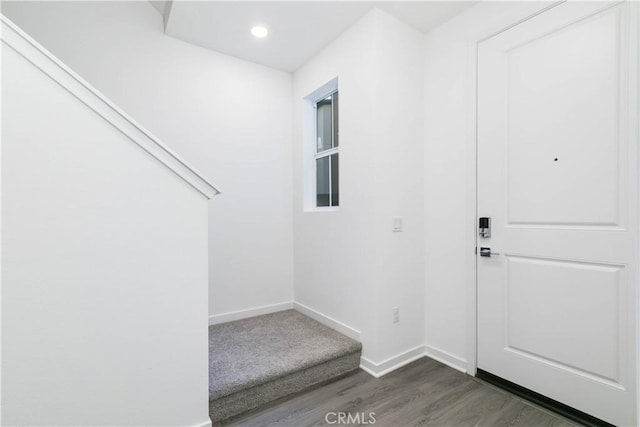 667 Limoncello Ln, Covina, CA 91723 - foyer featuring baseboards, dark wood-style floors, and recessed lighting