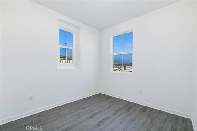 667 Limoncello Ln, Covina, CA 91723 - unfurnished room with dark wood finished floors and baseboards