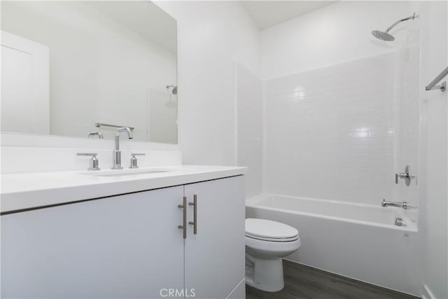 667 Limoncello Ln, Covina, CA 91723 - bathroom with vanity, toilet, tub / shower combination, and wood finished floors