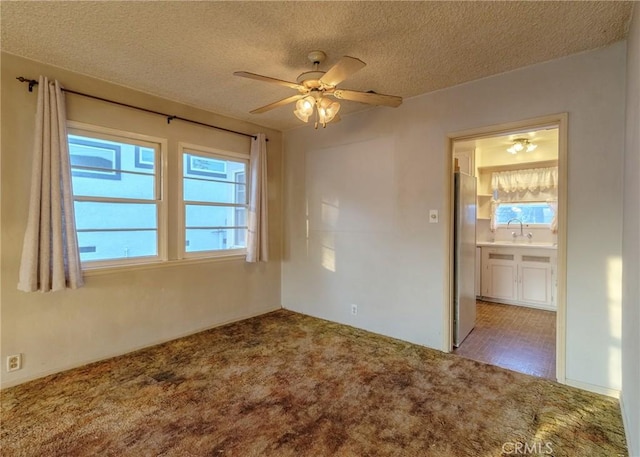 124 Mauna Loa Dr, Monrovia, CA 91016 - carpeted spare room with a ceiling fan and a textured ceiling