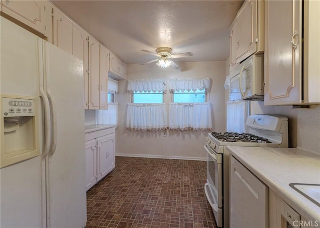 124 Mauna Loa Dr, Monrovia, CA 91016 - kitchen featuring white appliances, ceiling fan, light countertops, and white cabinets