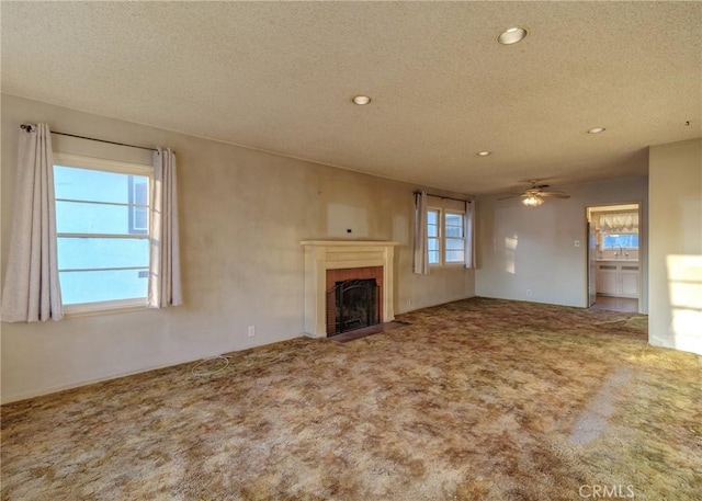 124 Mauna Loa Dr, Monrovia, CA 91016 - unfurnished living room with a textured ceiling, carpet, a fireplace with flush hearth, recessed lighting, and a ceiling fan