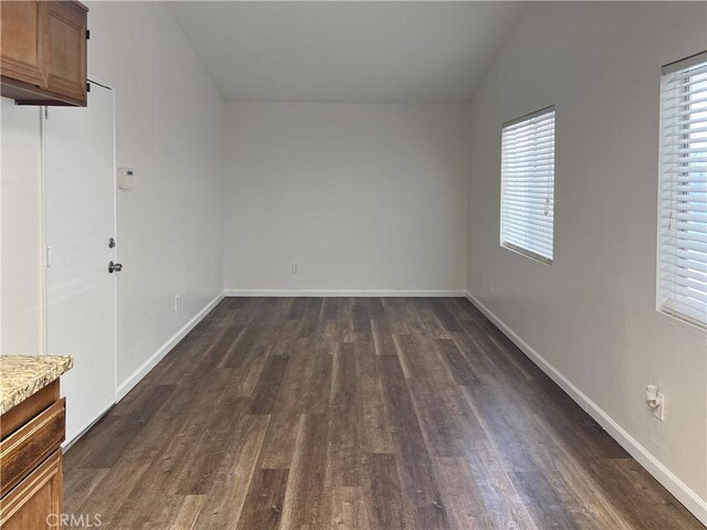 13941 Parkwood Dr, Fontana, CA 92337 - unfurnished room with dark wood-style floors