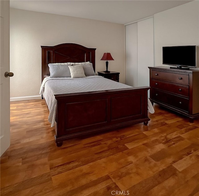 13941 Parkwood Dr, Fontana, CA 92337 - bedroom with wood finished floors and baseboards