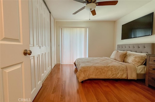 13941 Parkwood Dr, Fontana, CA 92337 - bedroom featuring wood finished floors, ceiling fan, and a closet