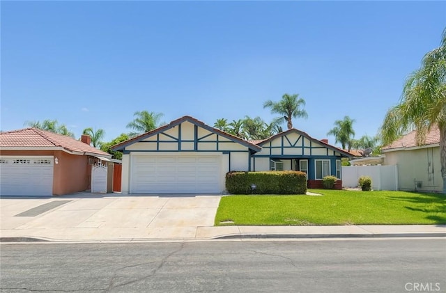 13941 Parkwood Dr, Fontana, CA 92337 - english style home with an attached garage and concrete driveway