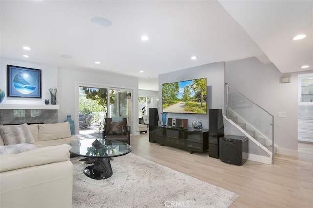24336 Hillview Dr, Laguna Niguel, CA 92677 - living area with stairway, recessed lighting, light wood-type flooring, baseboards, and a high end fireplace