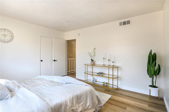 20234 Cohasset St Unit 3, Winnetka, CA 91306 - bedroom featuring wood finished floors and baseboards