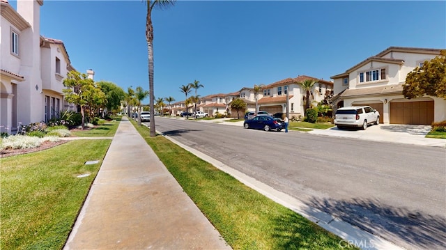 4312 Waterside Ln, Oxnard, CA 93035 - view of asphalt road with a residential view and sidewalks