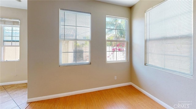 4312 Waterside Ln, Oxnard, CA 93035 - spare room featuring baseboards and light wood-style flooring