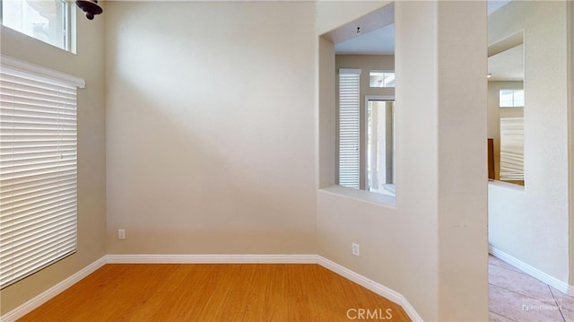 4312 Waterside Ln, Oxnard, CA 93035 - spare room with baseboards and wood finished floors