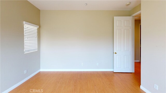 4312 Waterside Ln, Oxnard, CA 93035 - empty room featuring light wood-type flooring, baseboards, and a smoke detector