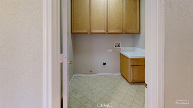 4312 Waterside Ln, Oxnard, CA 93035 - washroom featuring cabinet space, washer hookup, light floors, and hookup for an electric dryer