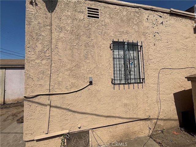 1434 W 92nd St, Los Angeles, CA 90047 - view of side of property featuring stucco siding