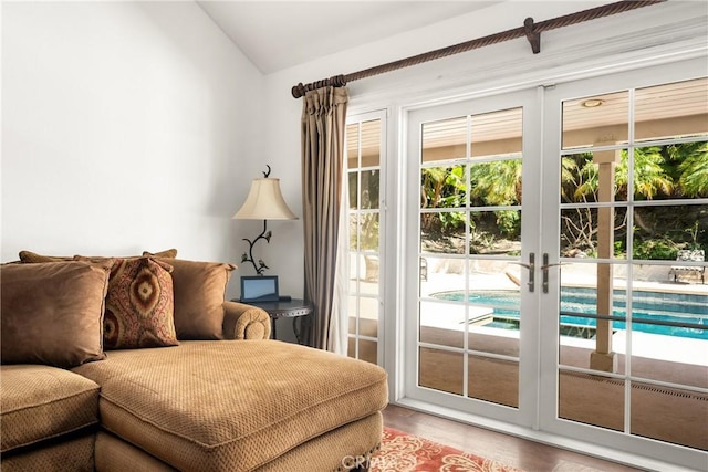 17927 Sun Hill Dr, Yorba Linda, CA 92886 - living area with vaulted ceiling, wood finished floors, and french doors