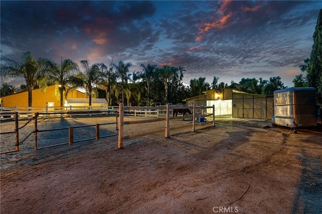 17927 Sun Hill Dr, Yorba Linda, CA 92886 - yard at dusk featuring an exterior structure and an outbuilding