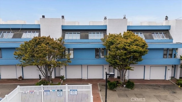 1617 Ramona, Grover Beach, CA 93433 - view of building exterior with a fenced front yard and an attached garage