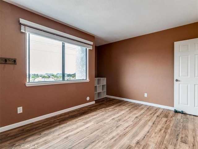 1617 Ramona, Grover Beach, CA 93433 - spare room with light wood-style floors and baseboards