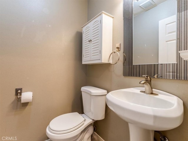 1617 Ramona, Grover Beach, CA 93433 - half bathroom featuring toilet and a sink