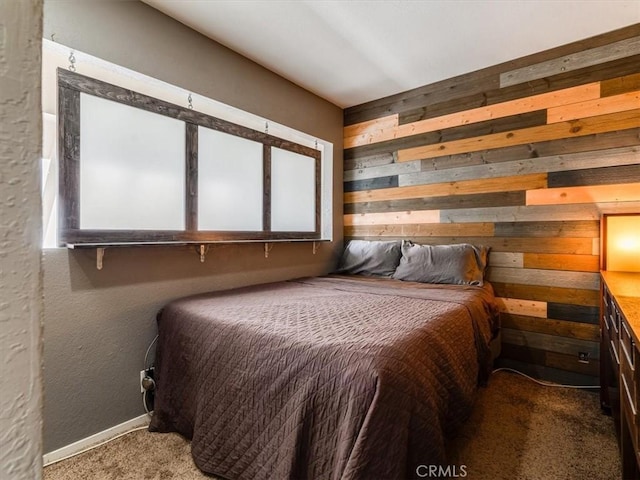 1617 Ramona, Grover Beach, CA 93433 - bedroom featuring wooden walls, carpet, a textured wall, and baseboards