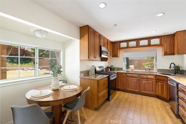 1188 Old Hickory Rd, Corona, CA 92882 - kitchen featuring stainless steel appliances, brown cabinets, healthy amount of natural light, light wood-style flooring, and recessed lighting
