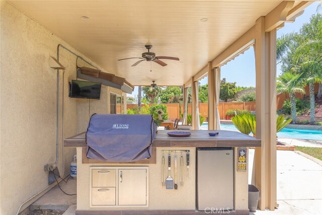 1188 Old Hickory Rd, Corona, CA 92882 - fenced backyard with area for grilling and ceiling fan