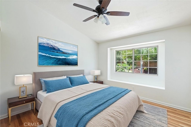 1188 Old Hickory Rd, Corona, CA 92882 - bedroom featuring wood finished floors, lofted ceiling, and a ceiling fan