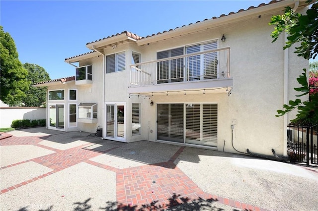 20485 Via Canarias, Yorba Linda, CA 92887 - rear view of property with a balcony, stucco siding, and a patio area