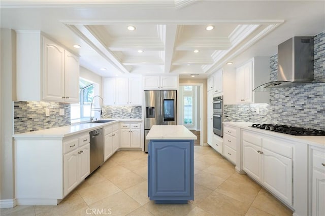 20485 Via Canarias, Yorba Linda, CA 92887 - kitchen featuring appliances with stainless steel finishes, wall chimney range hood, white cabinets, coffered ceiling, and ornamental molding