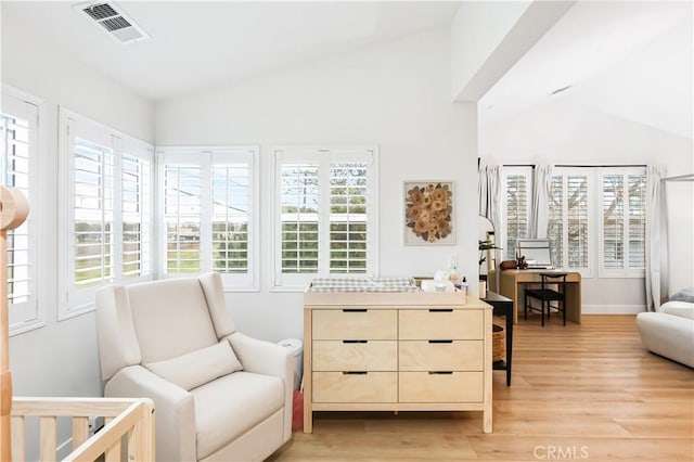 2294 Pacific Ave, Costa Mesa, CA 92627 - living area with vaulted ceiling, light wood finished floors, an office area, and baseboards