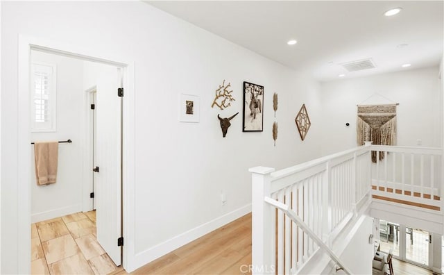 2294 Pacific Ave, Costa Mesa, CA 92627 - hall featuring an upstairs landing, recessed lighting, baseboards, and light wood-style floors