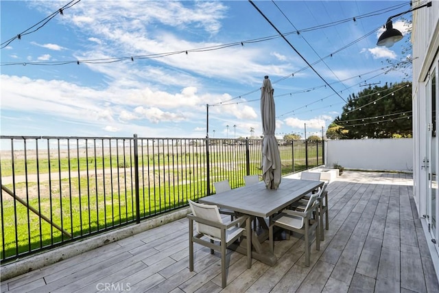 2294 Pacific Ave, Costa Mesa, CA 92627 - wooden deck with outdoor dining area